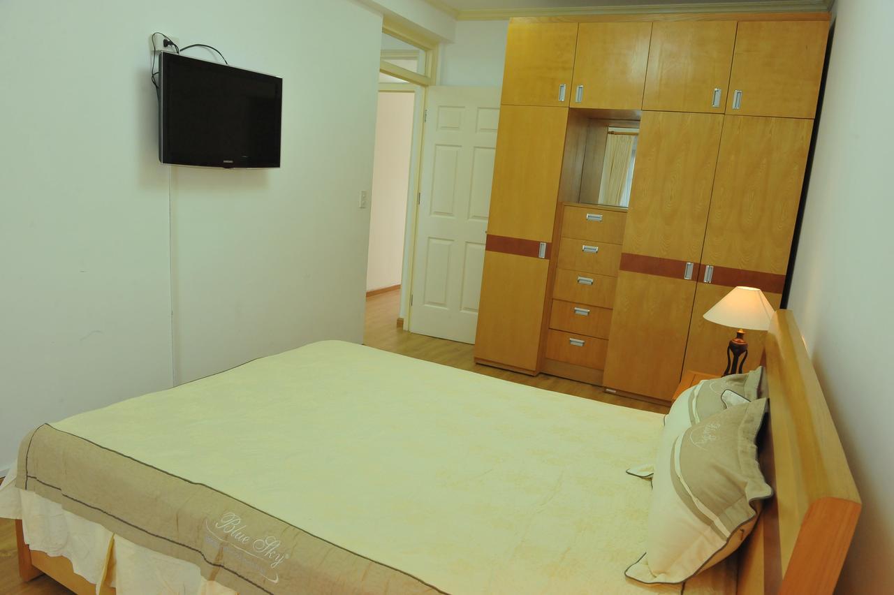 Coco Flower Village Serviced Apartment *